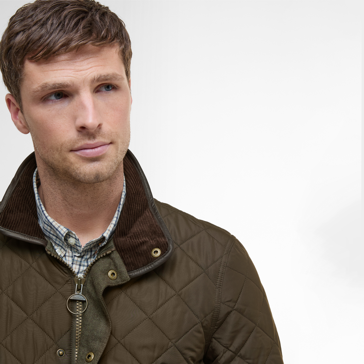 Close-up of Barbour corduroy collar and branded zip