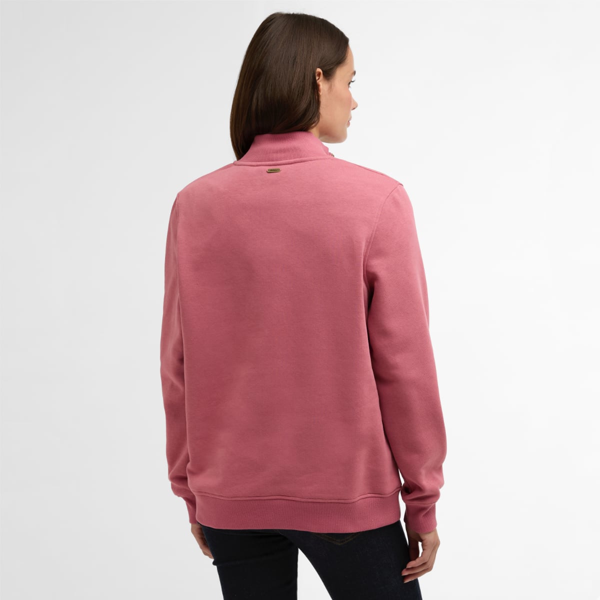 Back view of pink Barbour Cynthia Half Zip sweatshirt on a model showing a relaxed fit and ribbed hem