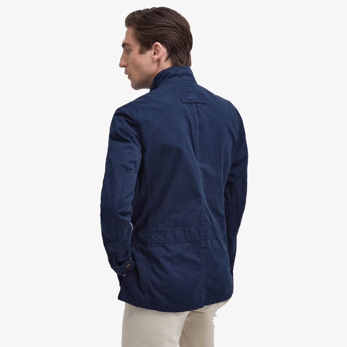 Back view of Barbour Corbridge Utility Jacket in navy on a male model.