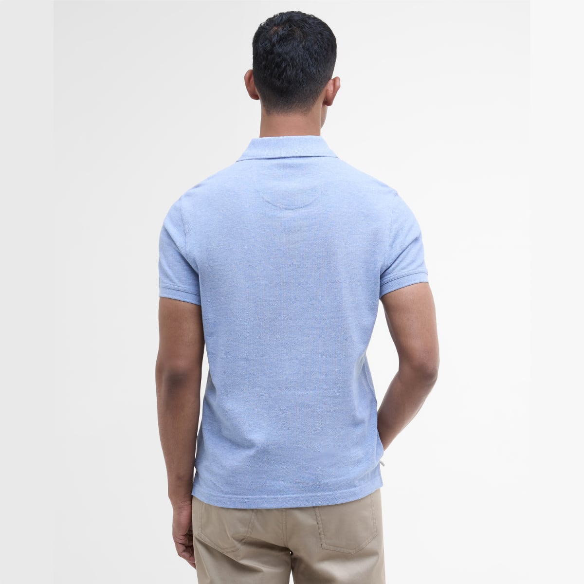 Back view of male model in sky marl Barbour Tartan Pique polo shirt