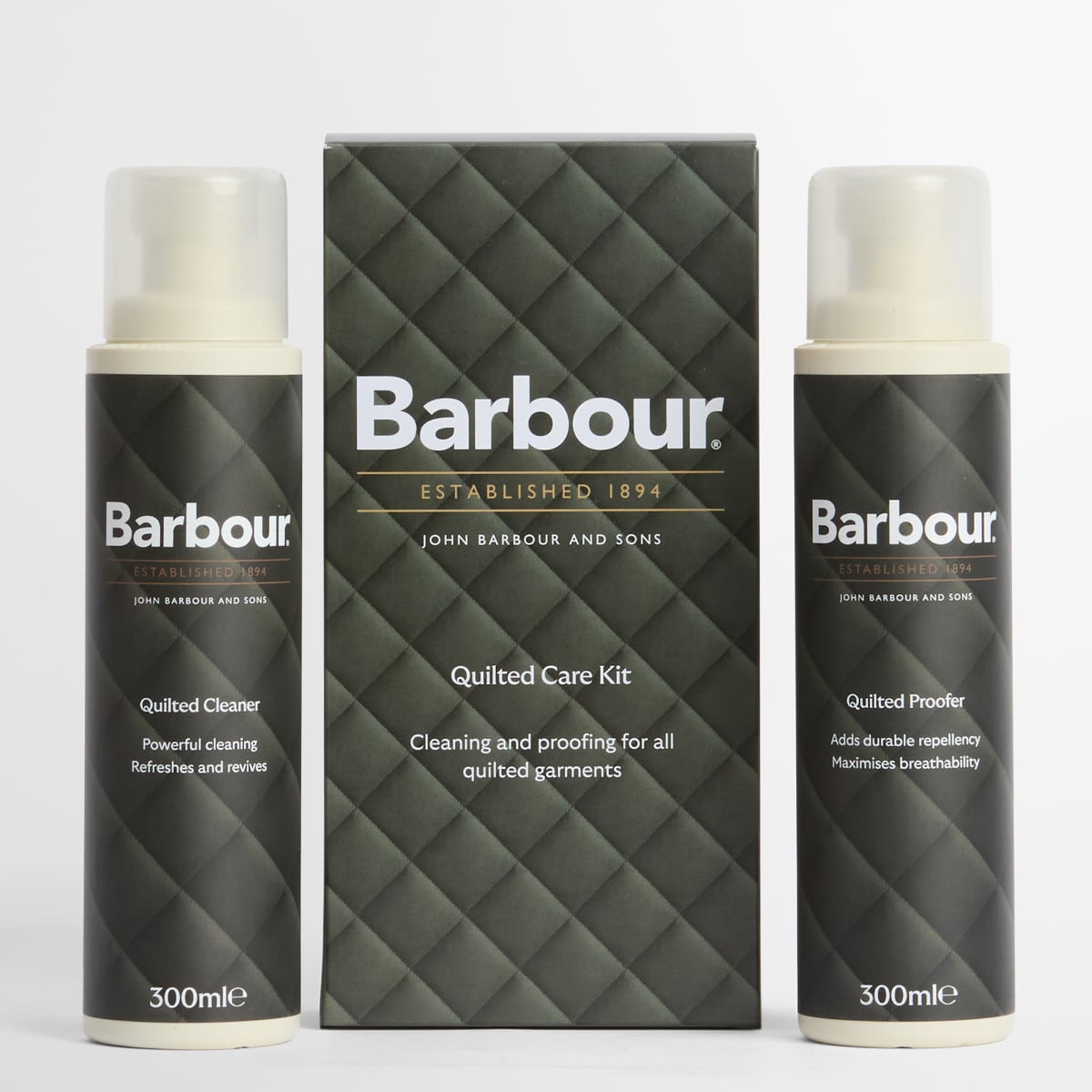 Barbour Quilted Jacket Care Kit flanked by two 300ml spray bottles beside a quilted box