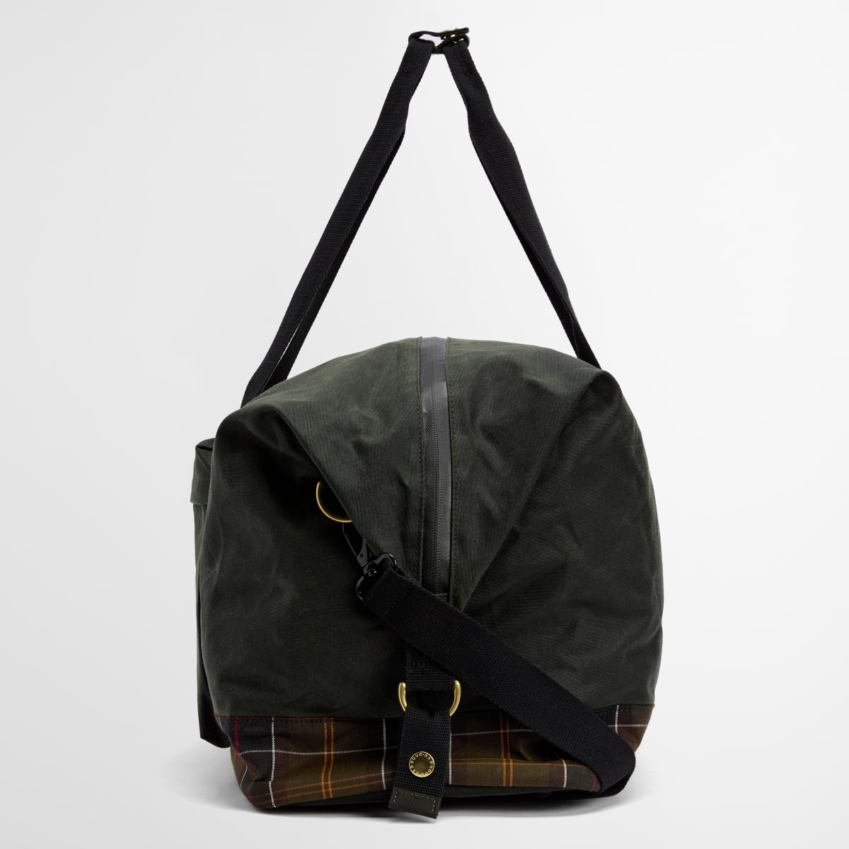 Side view of Barbour Field Wax Holdall Sage showing detachable shoulder strap and plaid bottom panel